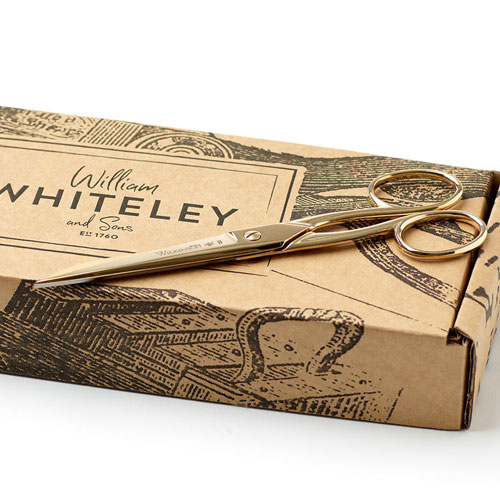Wilkinson 6″ Aura Gold Desk Scissors in full view with the packaging.
