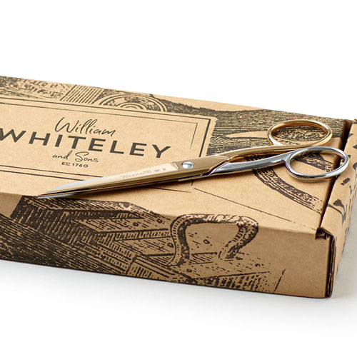Wilkinson Aura Contra Desk Scissors in full view with the packaging.