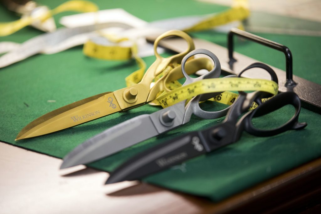 Master Tailor, Andrew Ramroop with new exo Wilkinson scissor range from William Whiteley and Son. Maurice Sedwell, 19 Savile Row, London. Please credit: © Jess Hurd