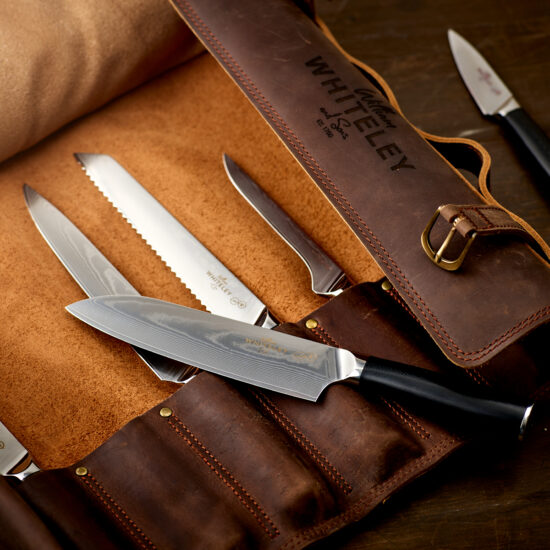 William Whiteley Chef’s Professional Damascus Knife Set in full view with the Handcrafted Leather Roll.