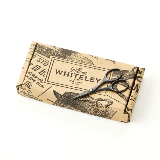 William Whiteley Noir Embroidery Scissors in full view with Whiteley's packaging.