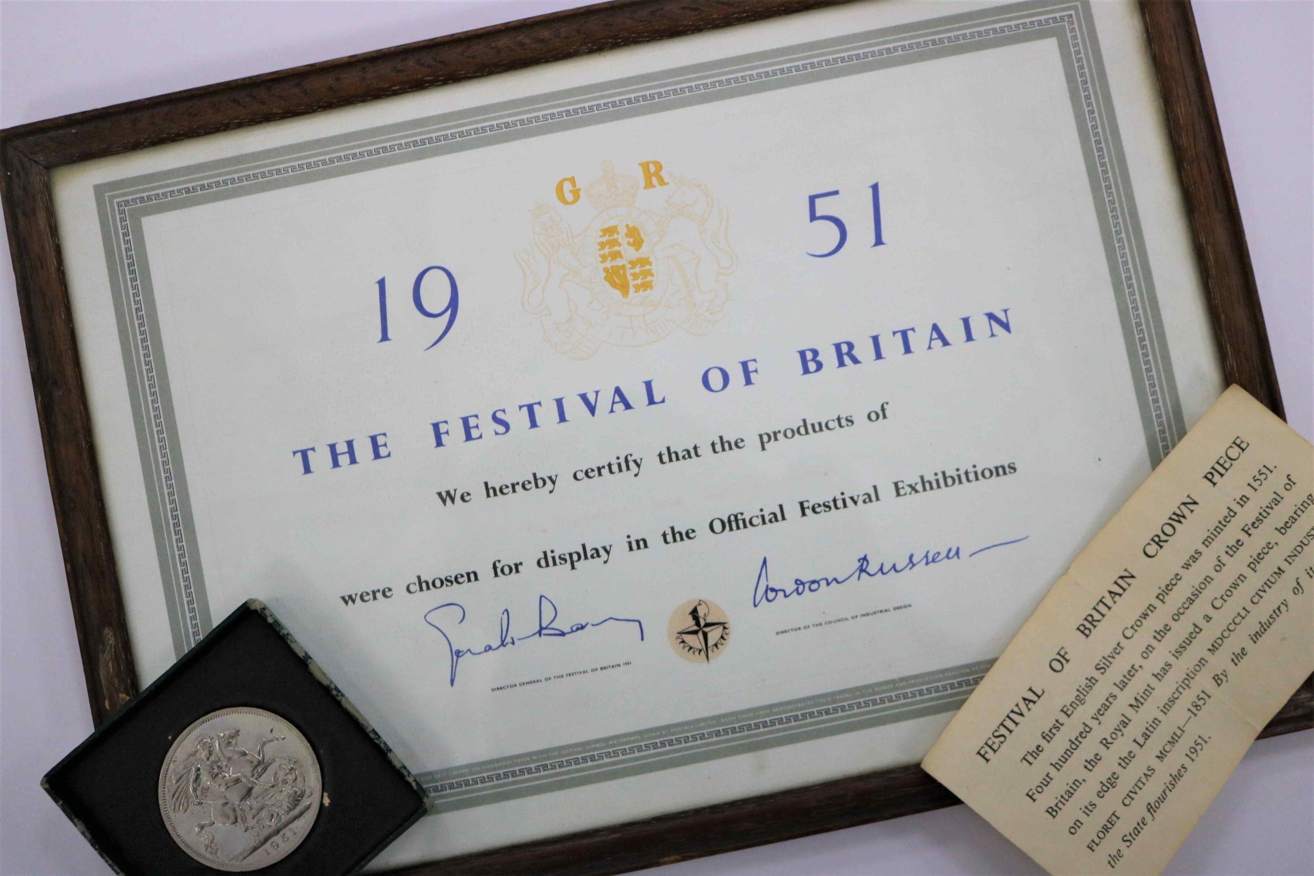 the certificate given at the Festival of Britain with the coin presented