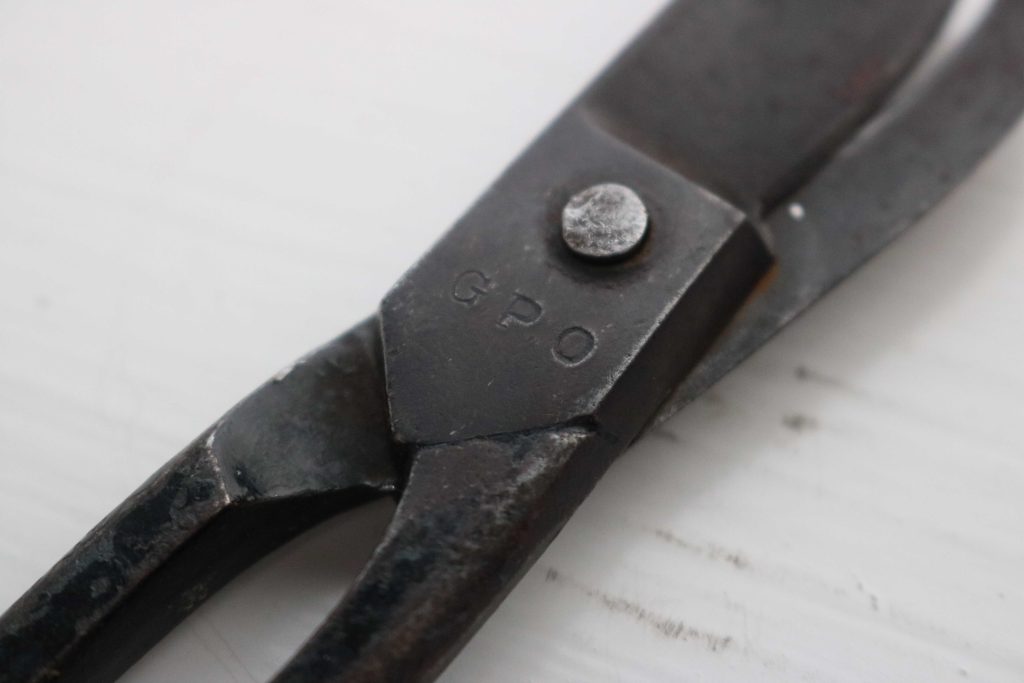 old GPO mailbag scissor marking closeup