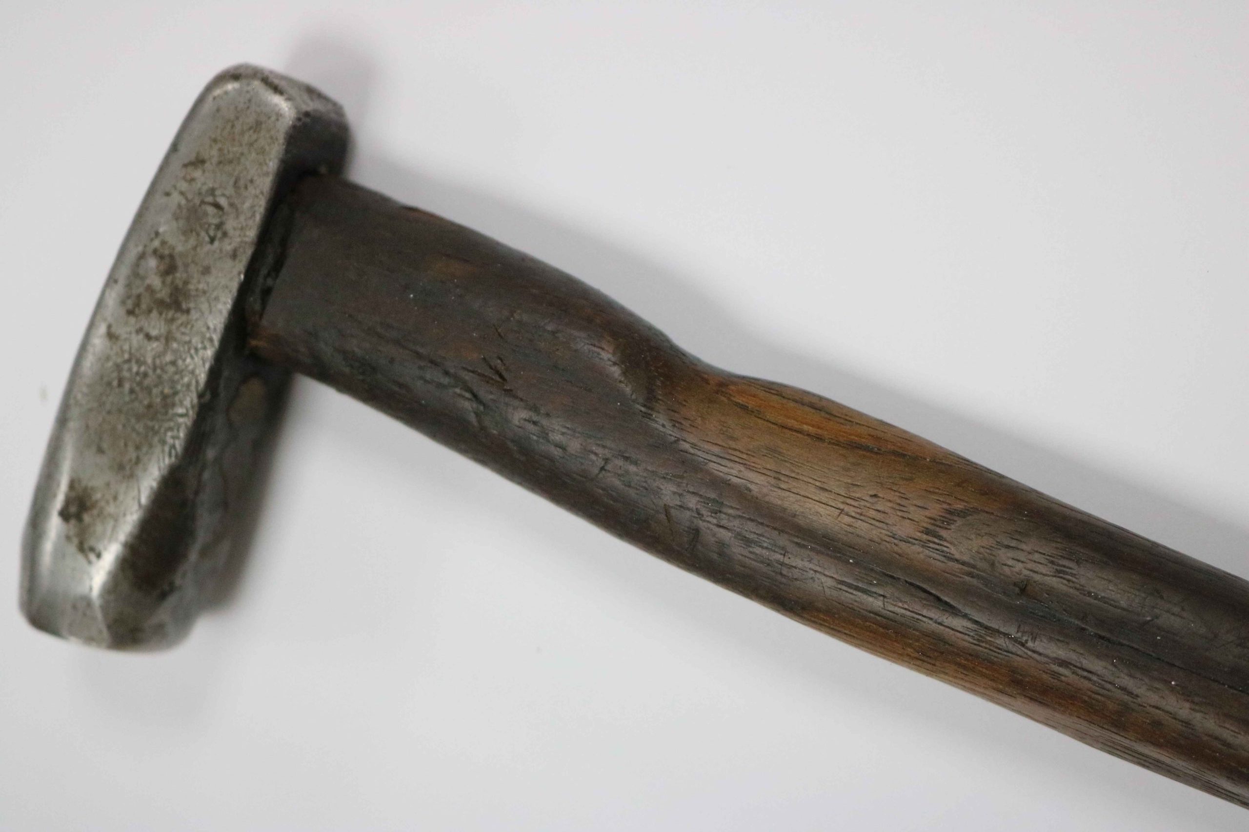 thumb grove worn into 100 year old hammer