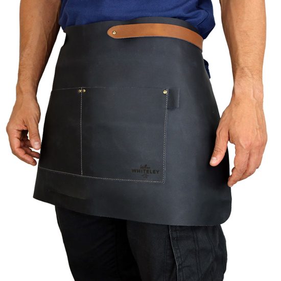 Whiteley short leather apron on model