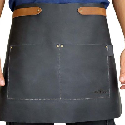 Whiteley short leather apron on model