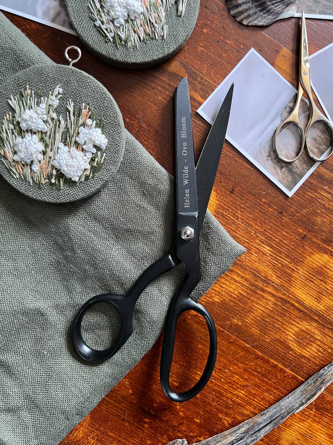 Pair of luxury scissors against a lifestyle backdrop